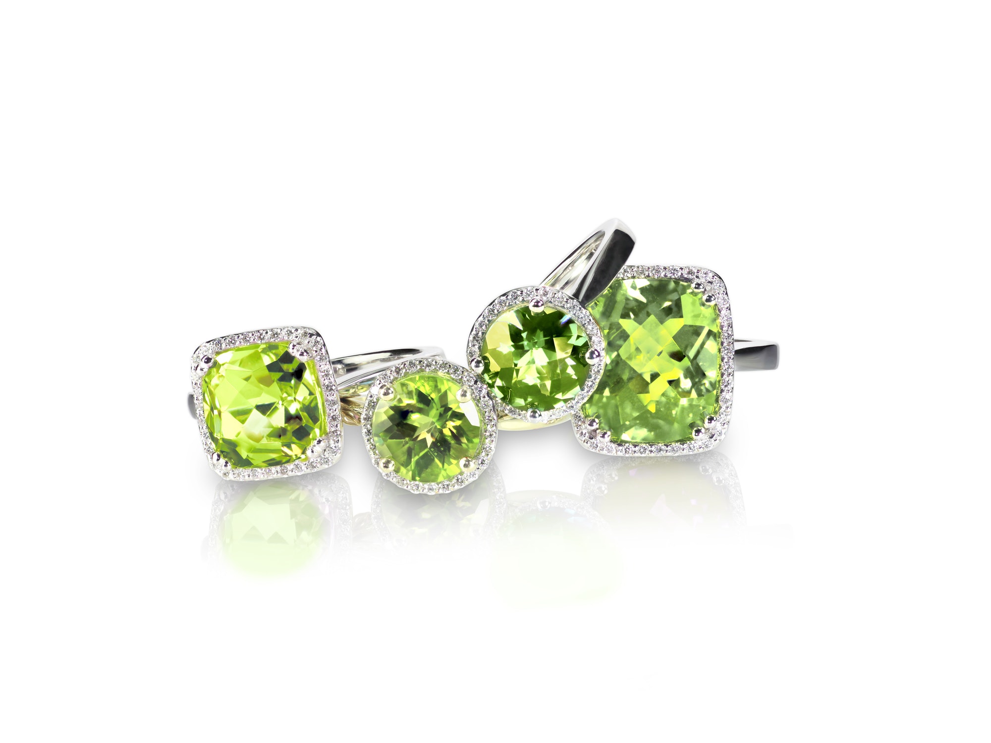 set-of-green-peridot-diamond-rings-gemstone-fine-jewelry-group-stack.jpg