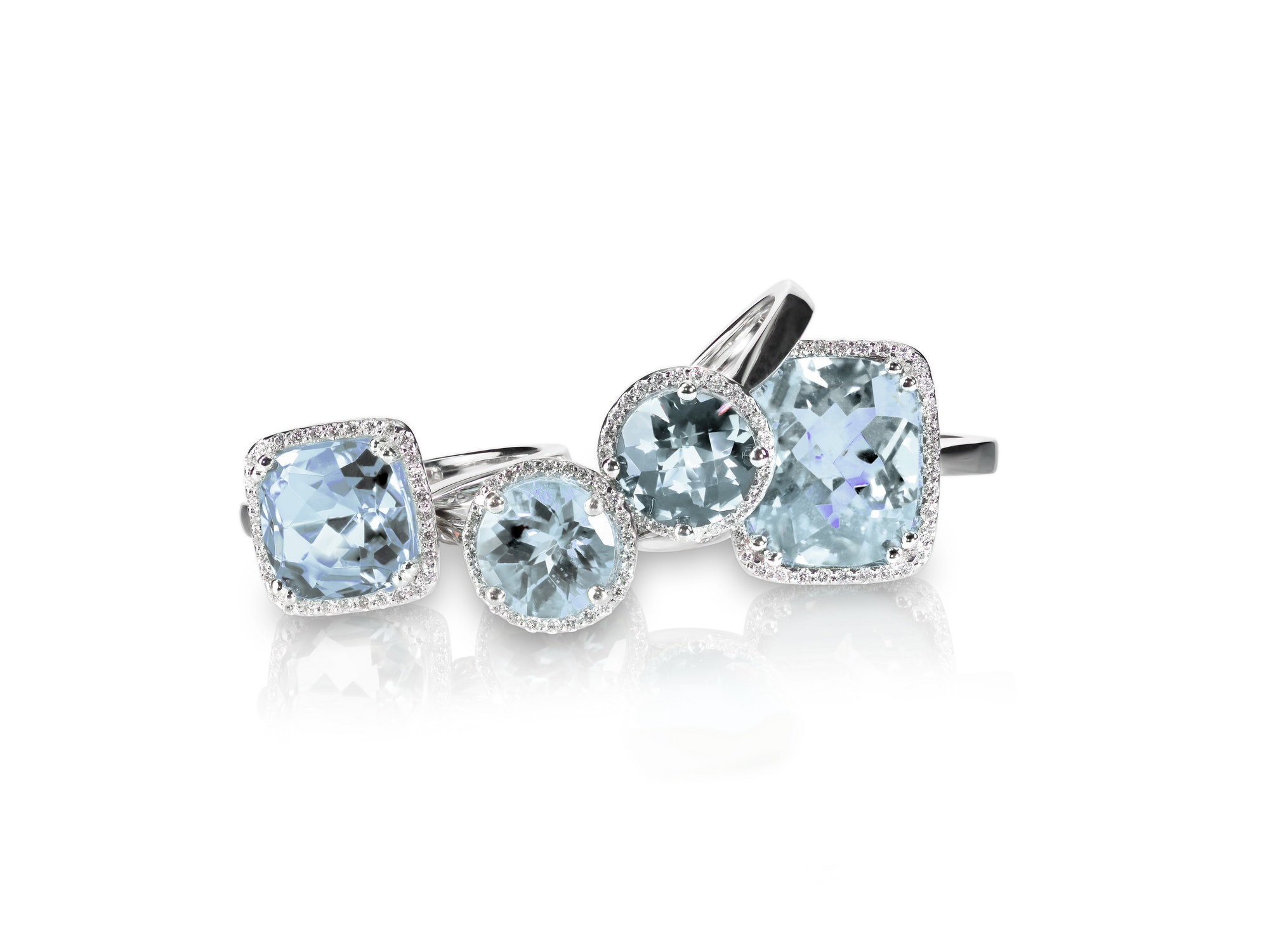 set-stack-grouping-of-blue-topaz-aquamarine-gemstone-and-diamondrings-.jpg